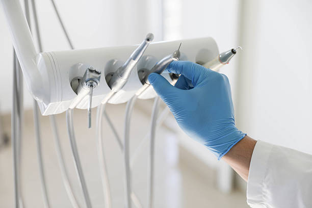 Professional Invisalign Clear Aligners technician working in Teague, TX